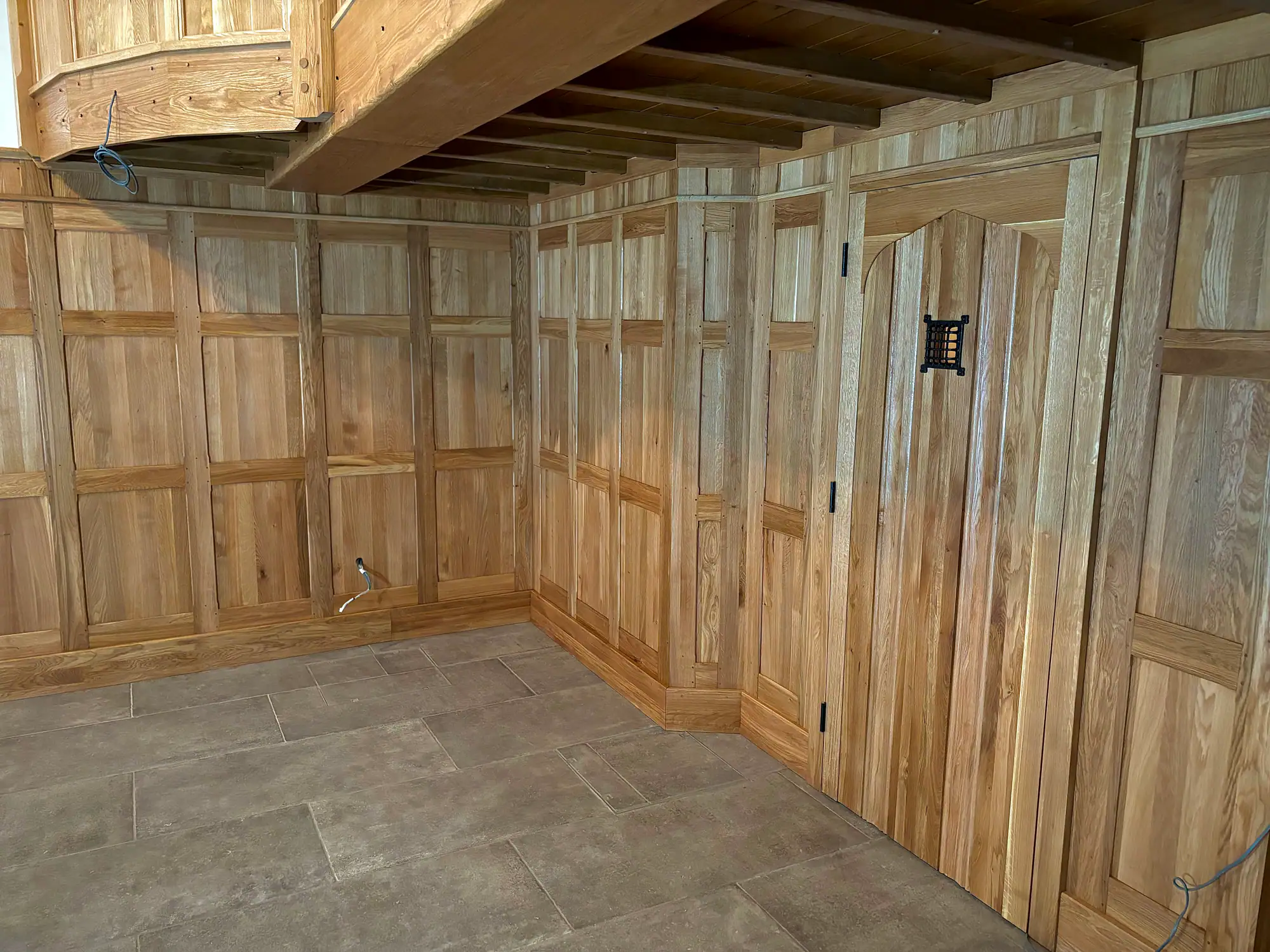 Custom oak wall panelling recorded in the portfolio at Sandringham